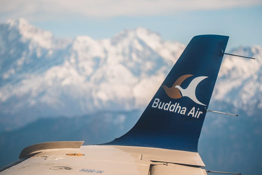 View from aircraft window of Nepal's snowy mountains